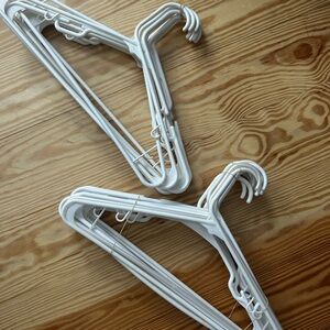 Bundle of 20 white plastic hangers